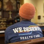 JC sits in a pew at St.Stephen's church in Washington, D.C. after preparing meals at Loaves and Fishes.