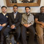 Four of our Young Advocates Leadership Lab sit on a leather sofa in Representative Neal's office after a congressional office visit.