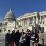 Y.A.L.L. students gather for a photo in front of Capitol Hill before their lobby visits.